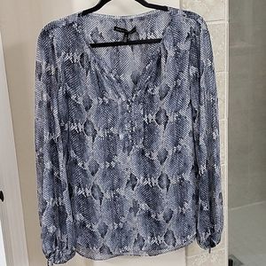 Blue snakeskin pattern sheer blouse.